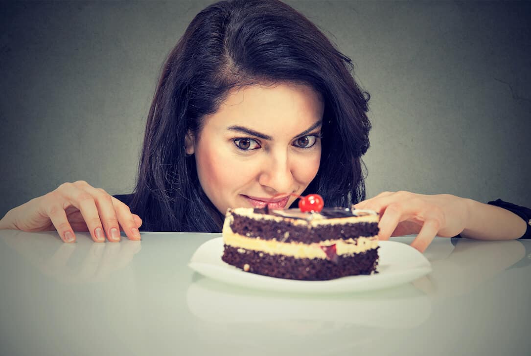 Woman craving cake dessert, eager to eat, isolated on gray background – 20  Fit